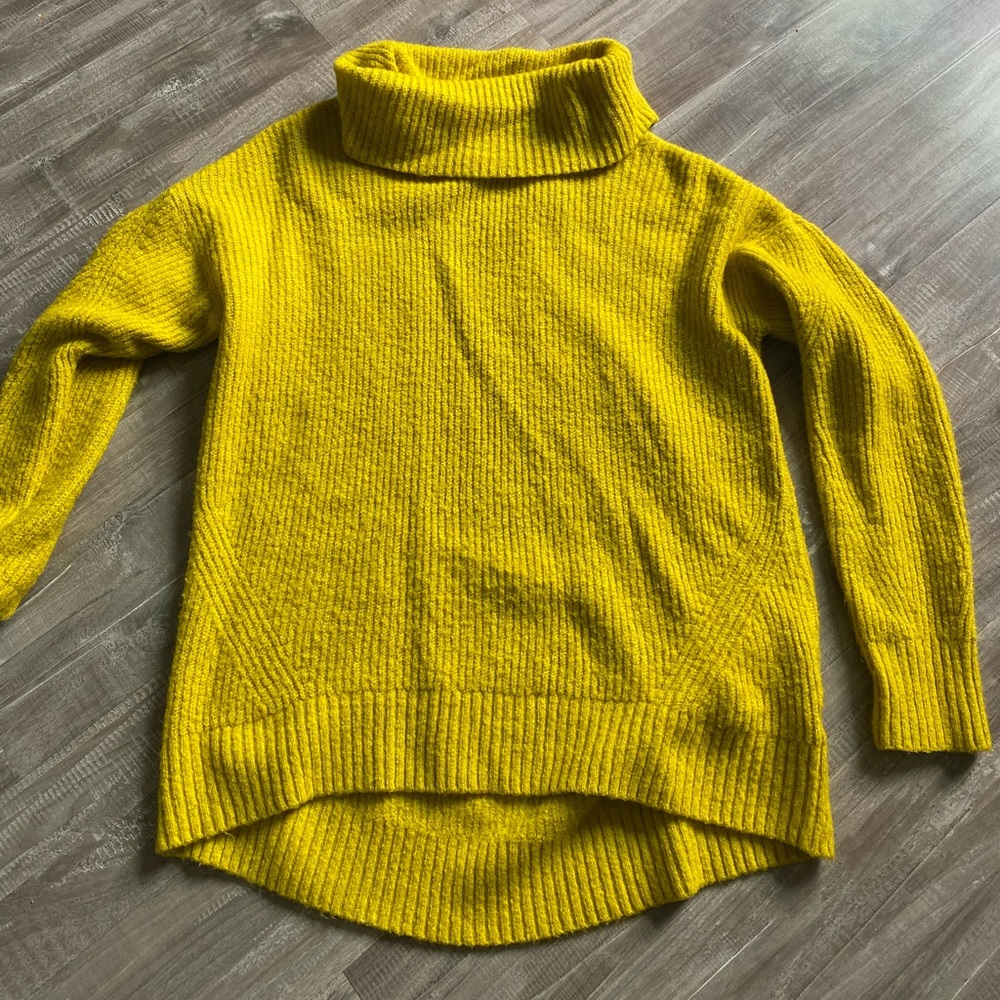 Yellow turtleneck sweater